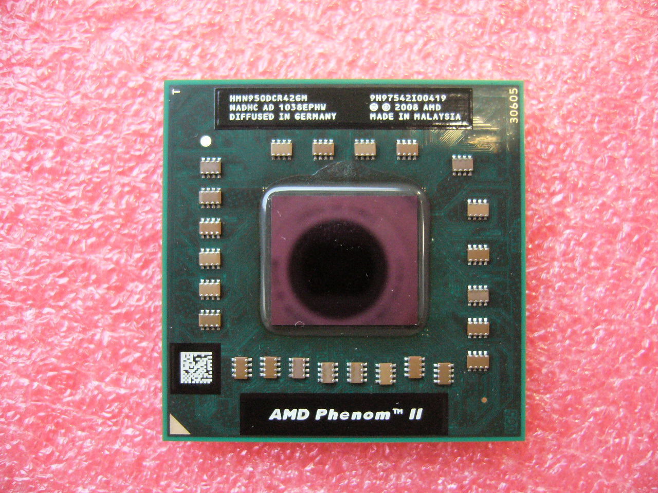 QTY 1x AMD Phenom II N950 2.1 GHz Quad-Core (HMN950DCR42GM) Laptop CPU Socket S1 - Click Image to Close